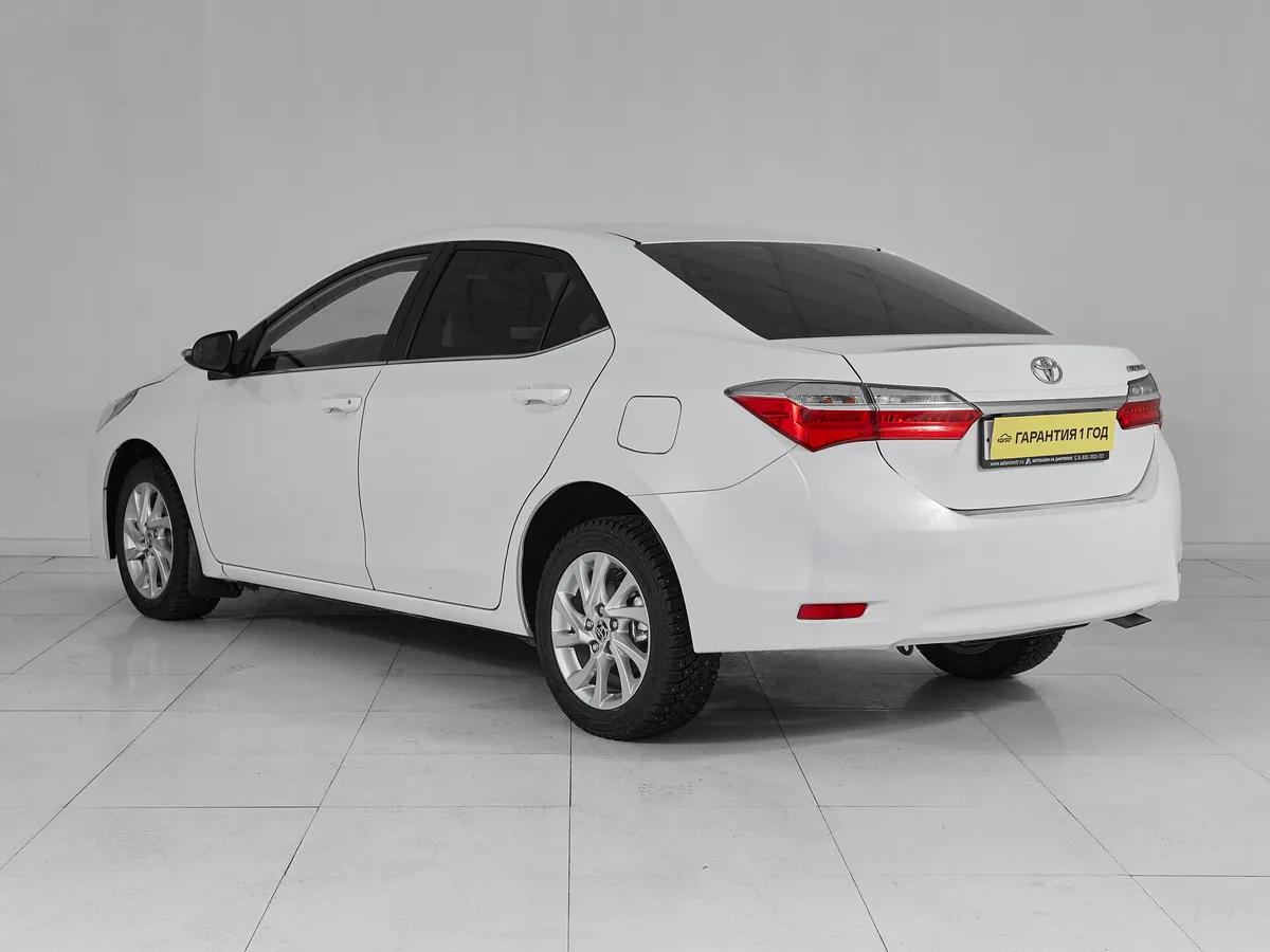 Toyota Corolla XI (E160, E170, E180) Рестайлинг 1 · Стиль — фото 4