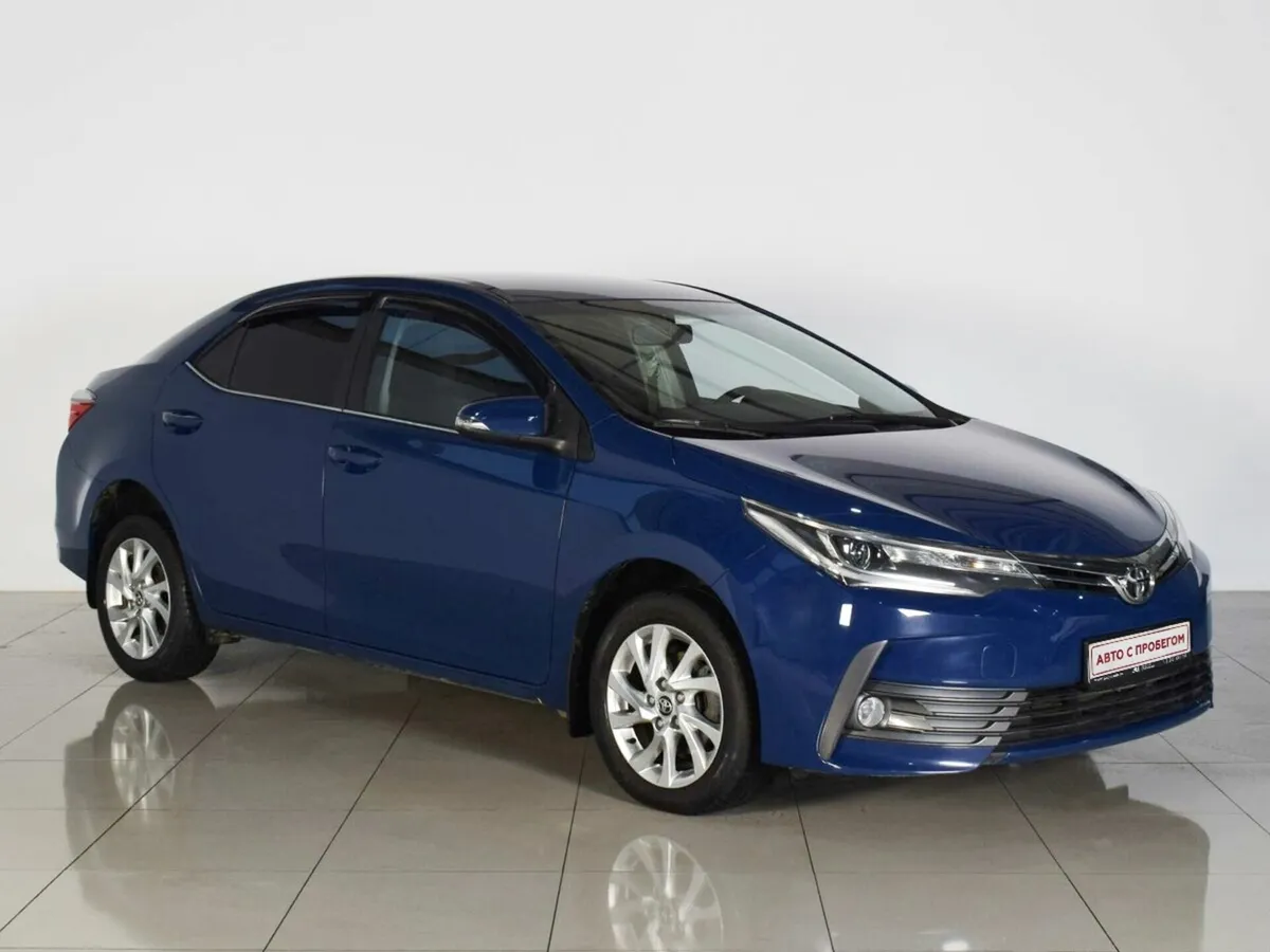 Toyota Corolla XI (E160, E170, E180) Рестайлинг 1 · Комфорт