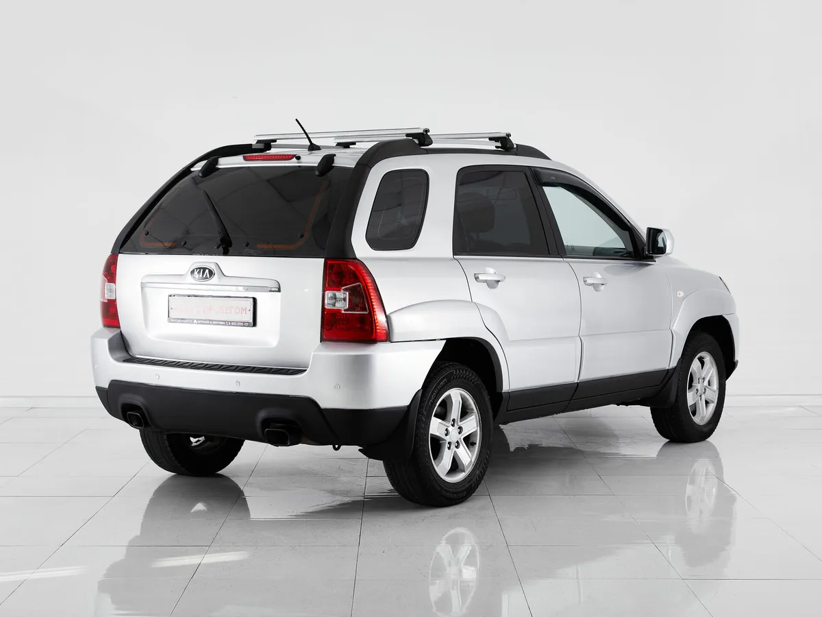 Kia Sportage II Рестайлинг · Comfort — фото 5