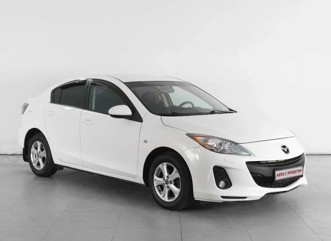 Mazda 3 II (BL) Рестайлинг · Touring Plus