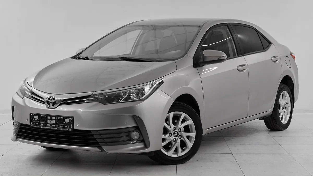 Toyota Corolla XI (E160, E170, E180) Рестайлинг 1 · Стиль