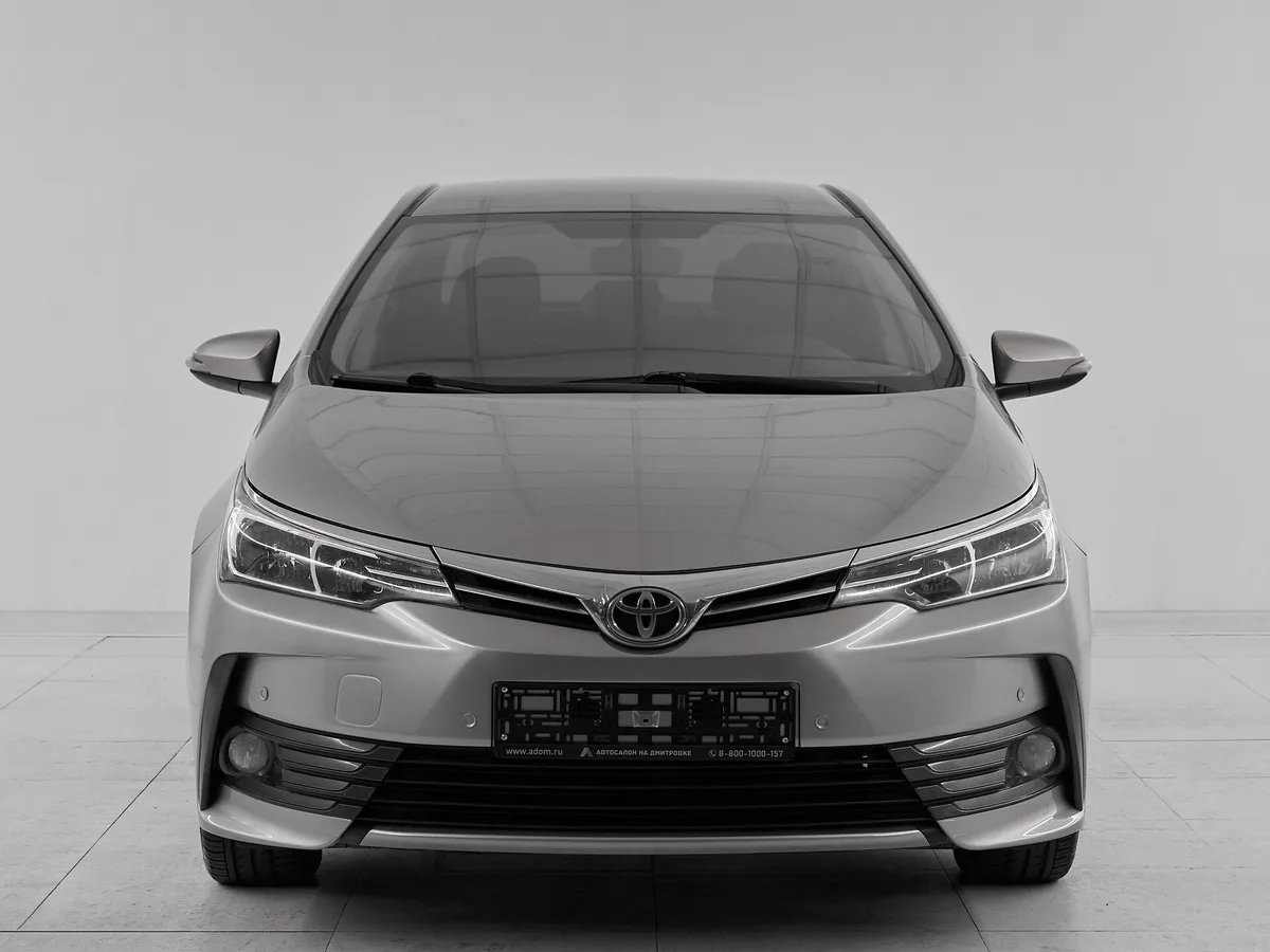 Toyota Corolla XI (E160, E170, E180) Рестайлинг 1 · Стиль — фото 2