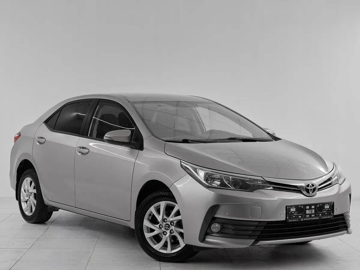 Toyota Corolla XI (E160, E170, E180) Рестайлинг 1 · Стиль — фото 3