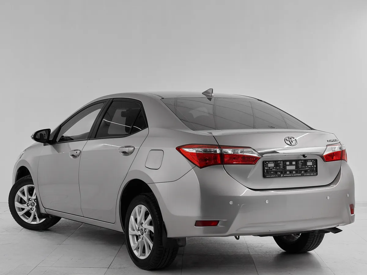 Toyota Corolla XI (E160, E170, E180) Рестайлинг 1 · Стиль — фото 4