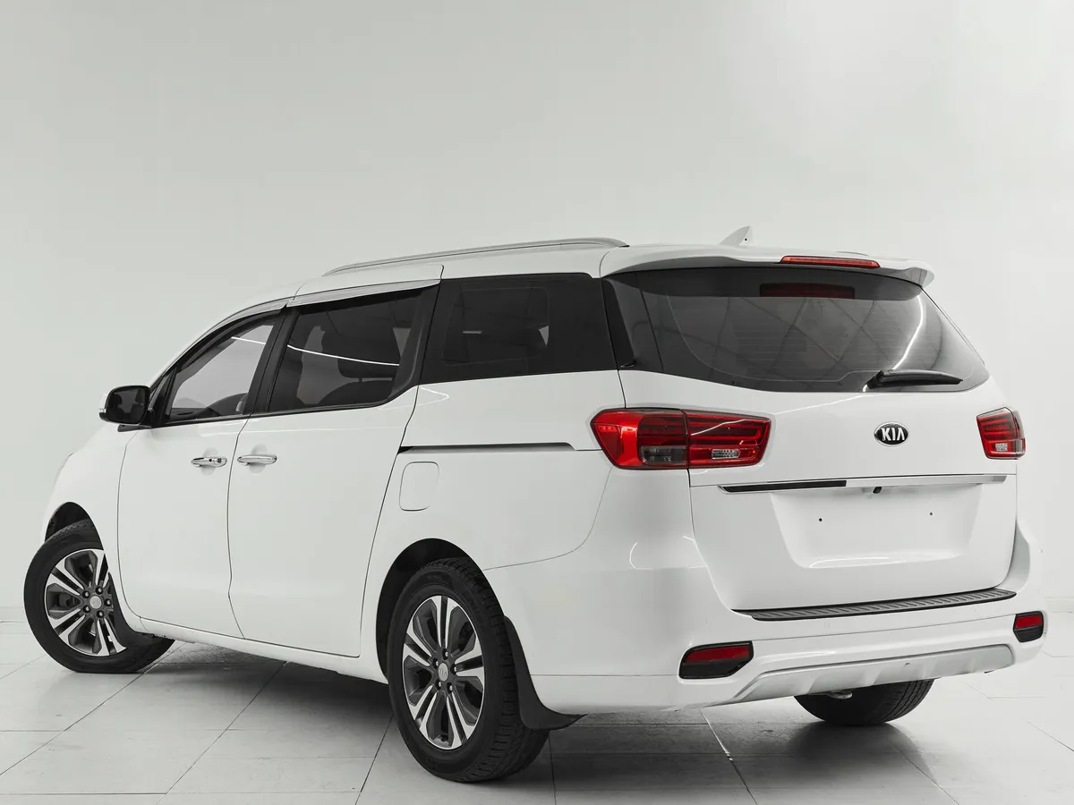 Kia Carnival III — фото 4