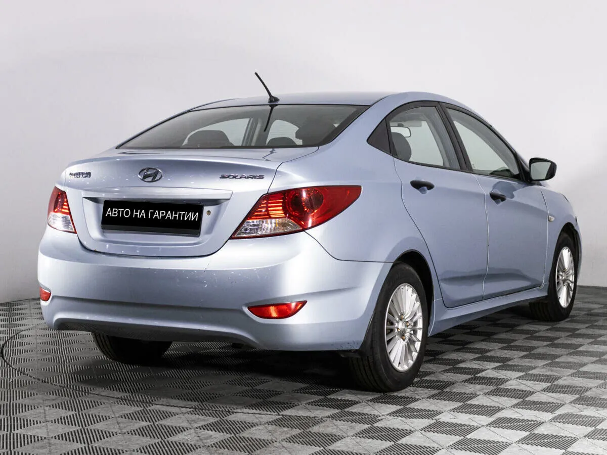 Hyundai Solaris I · Optima — фото 3