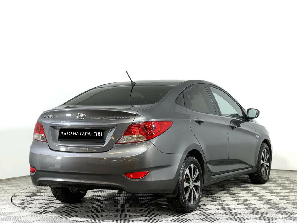 Hyundai Solaris I · Optima — фото 3