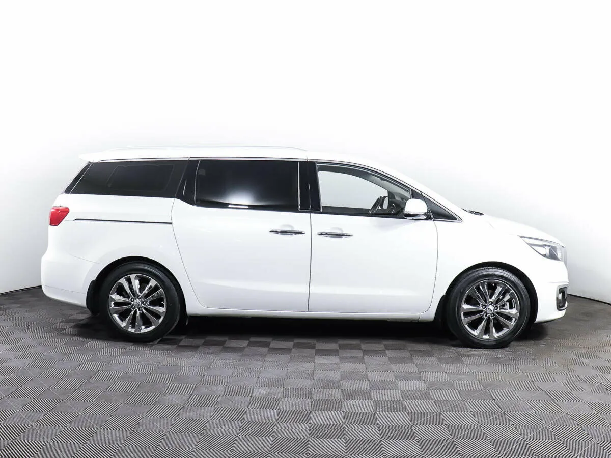 Kia Carnival III — фото 4