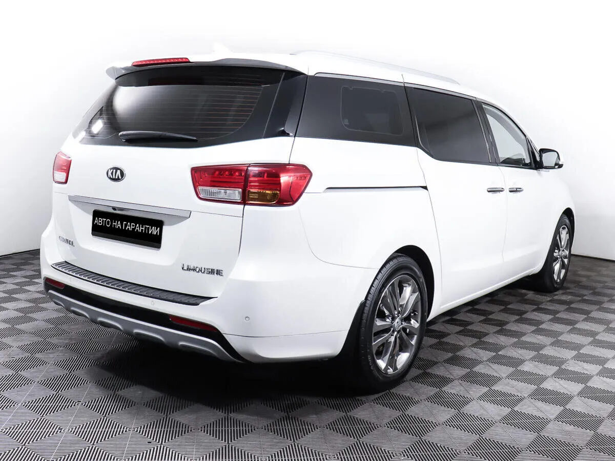 Kia Carnival III — фото 5