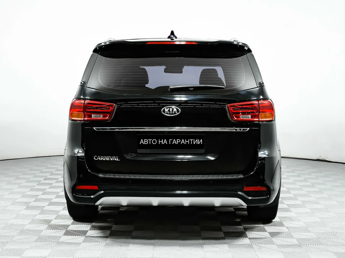 Kia Carnival III — фото 4