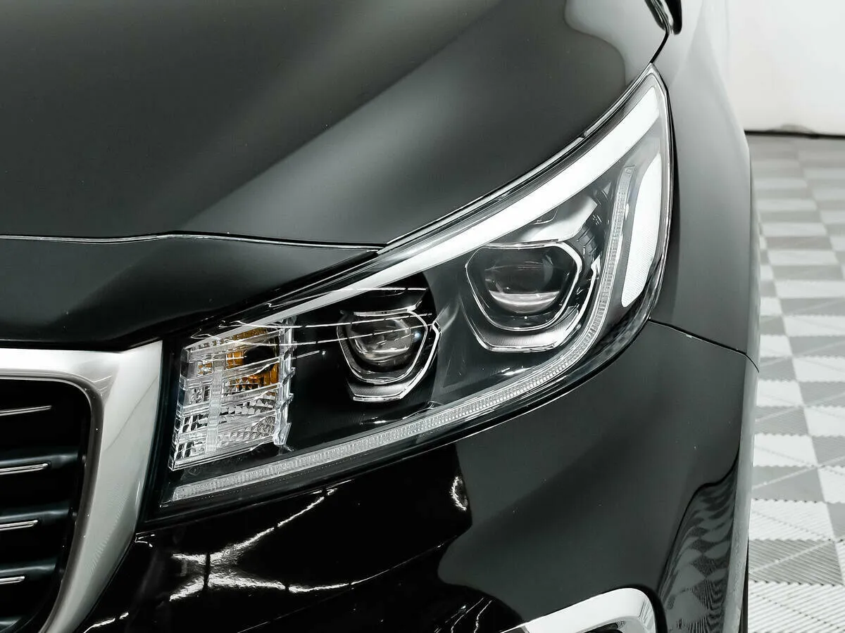 Kia Carnival III — фото 5