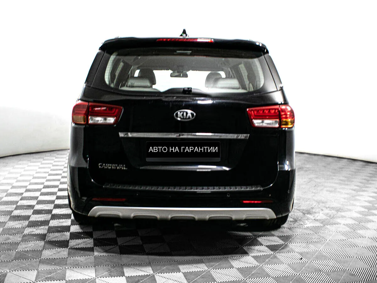 Kia Carnival III — фото 4