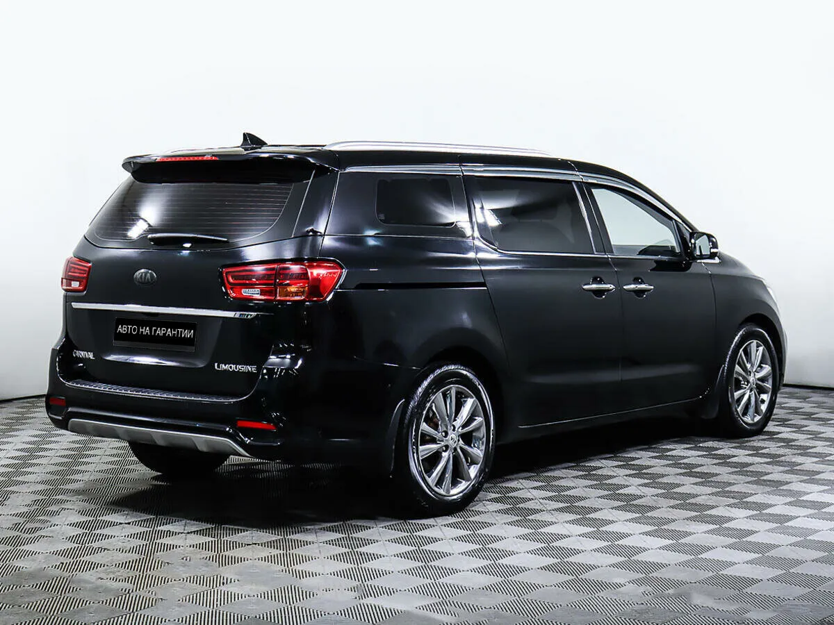 Kia Carnival III — фото 5