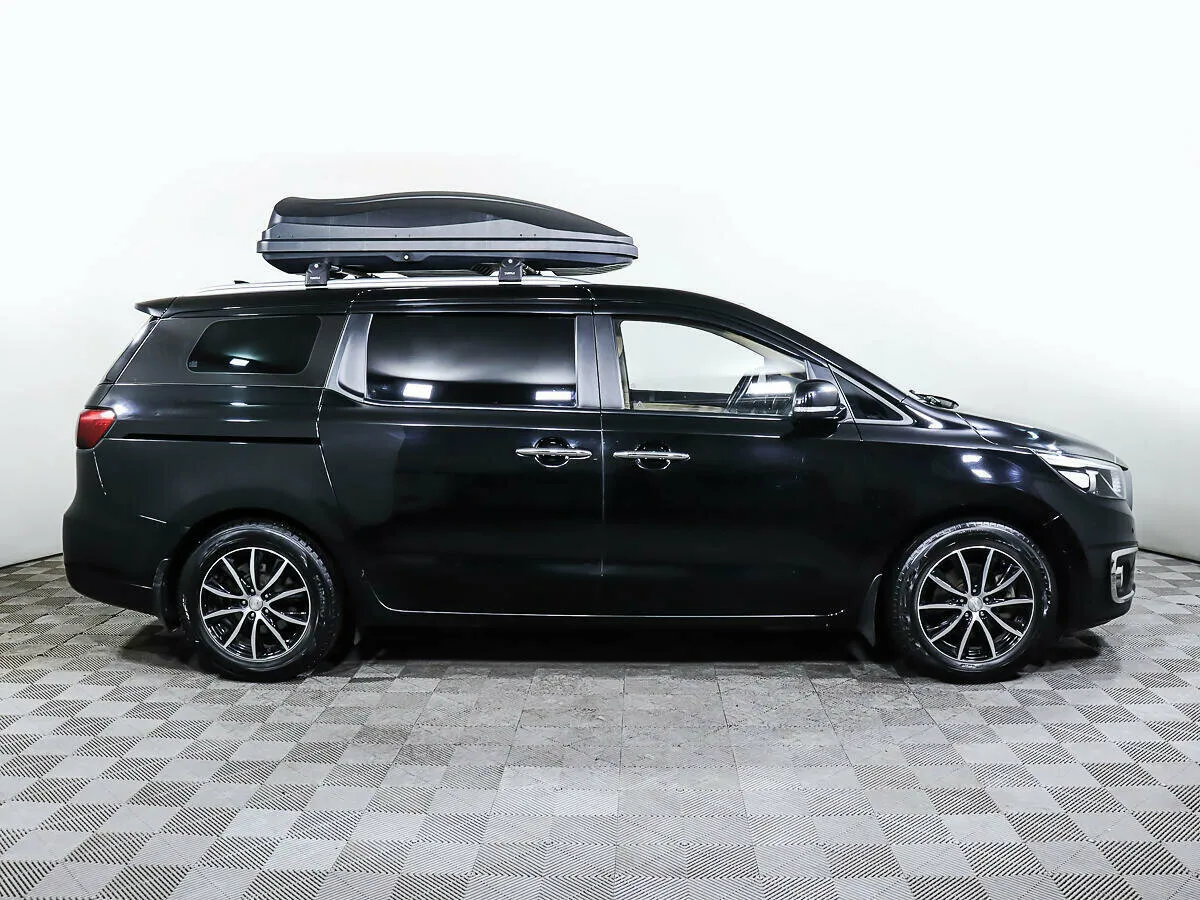 Kia Carnival III — фото 4