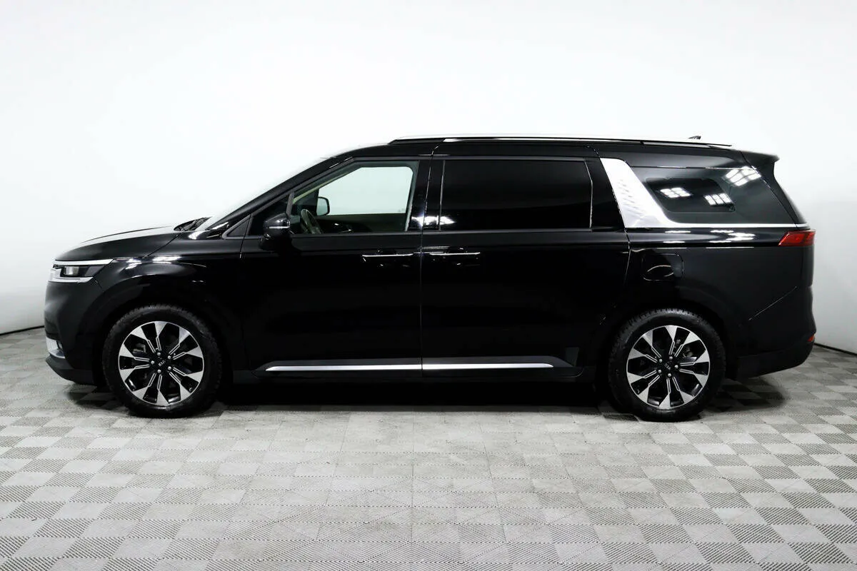 Kia Carnival III — фото 3