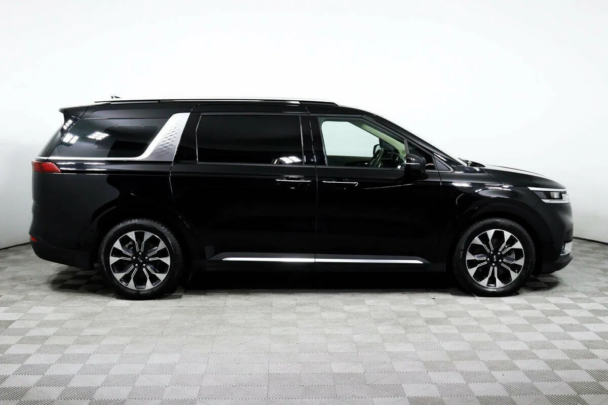 Kia Carnival III — фото 4