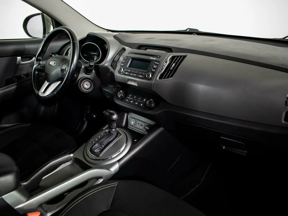 Kia Sportage III Рестайлинг · Comfort — фото 5