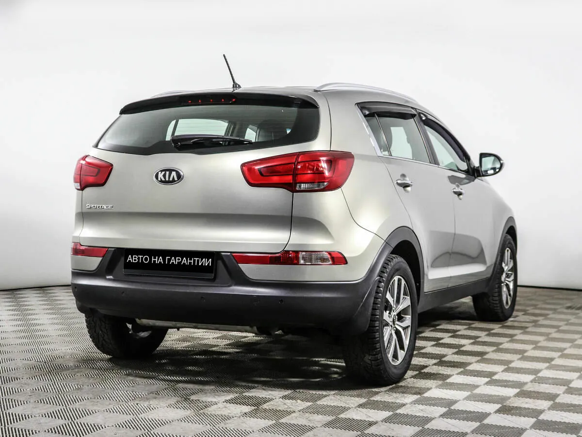 Kia Sportage III Рестайлинг · Classic +обогрев — фото 3