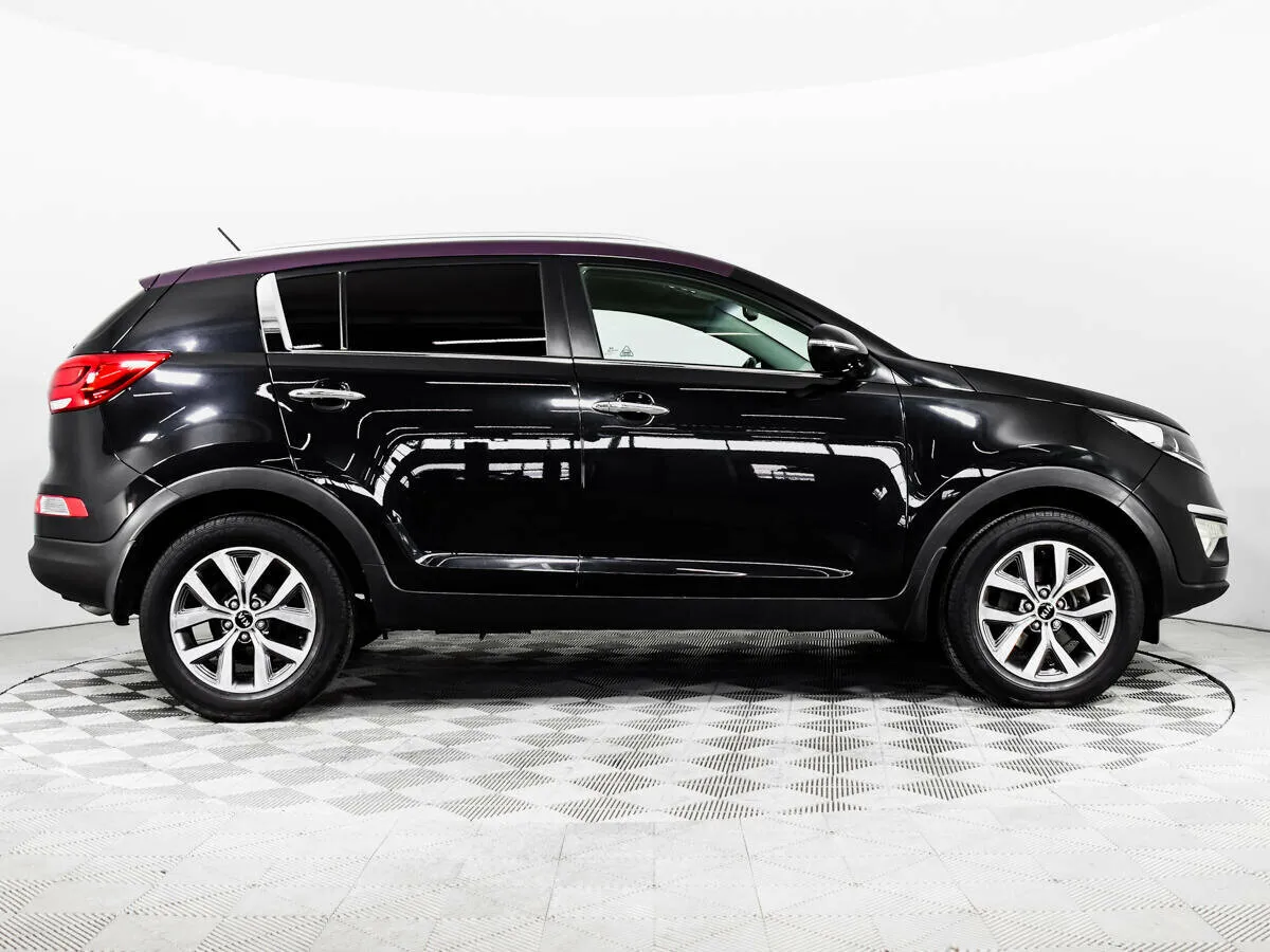 Kia Sportage III Рестайлинг · Classic +обогрев — фото 4
