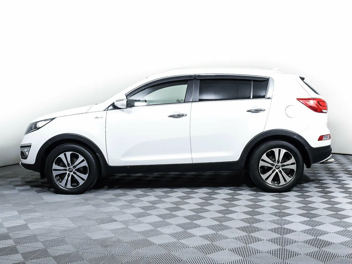 Kia Sportage III Рестайлинг · Comfort — фото 3