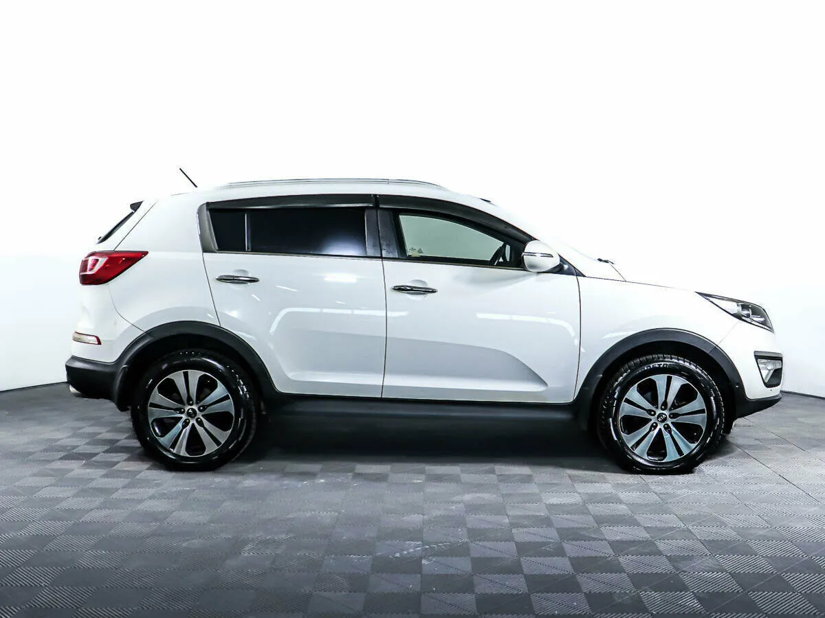 Kia Sportage III — фото 4