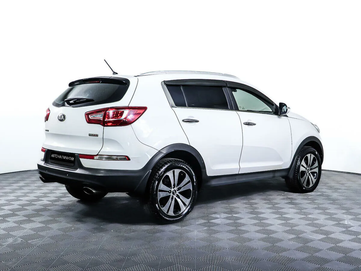 Kia Sportage III — фото 5