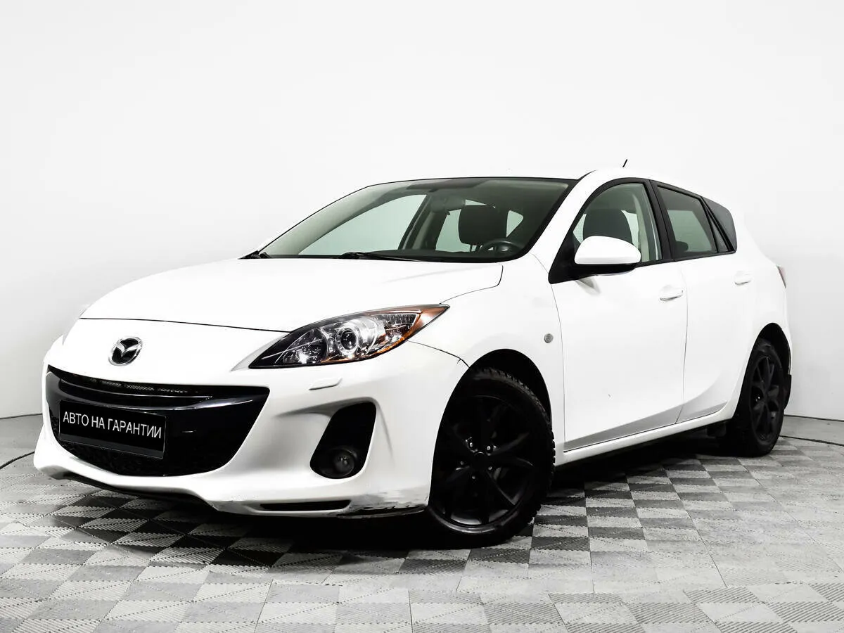 Mazda 3 II (BL) Рестайлинг · Touring Plus