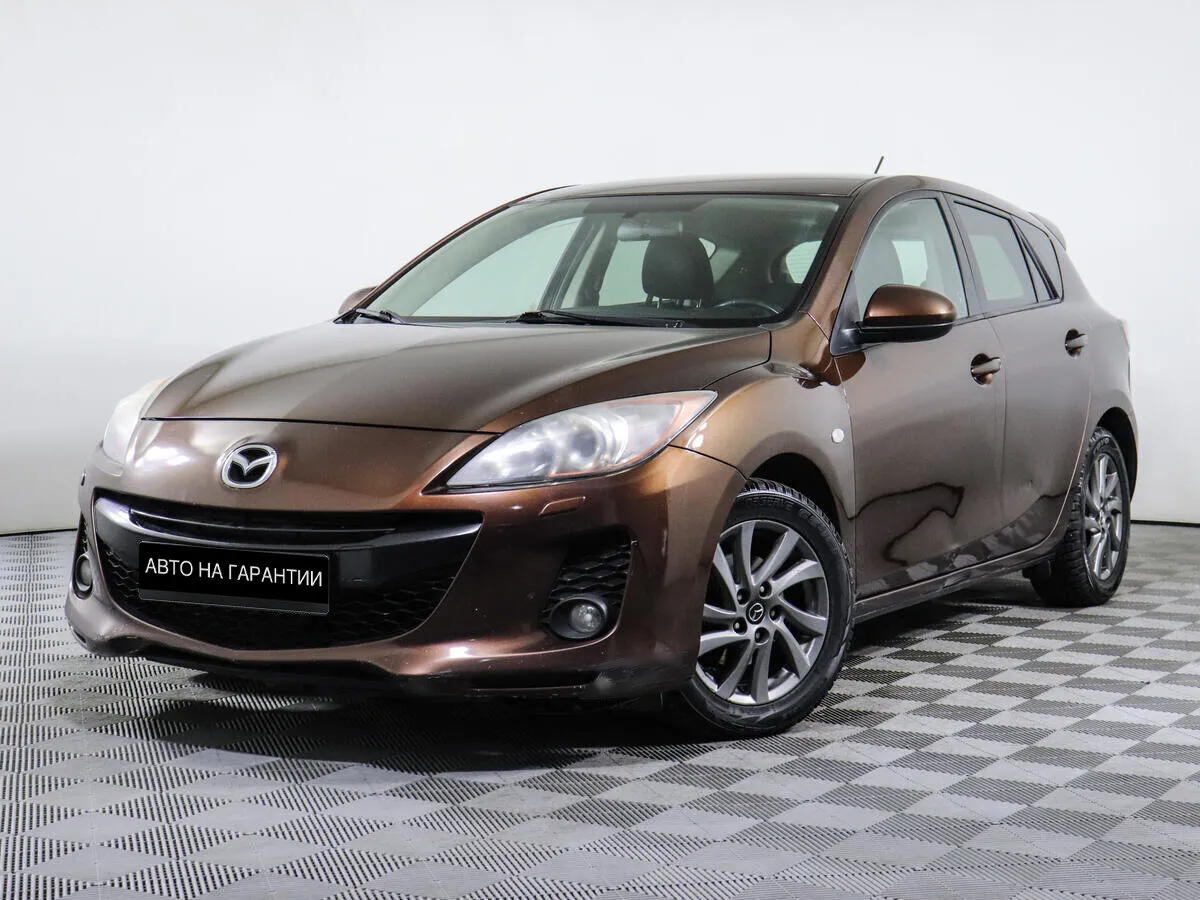 Mazda 3 II (BL) Рестайлинг · Touring Plus