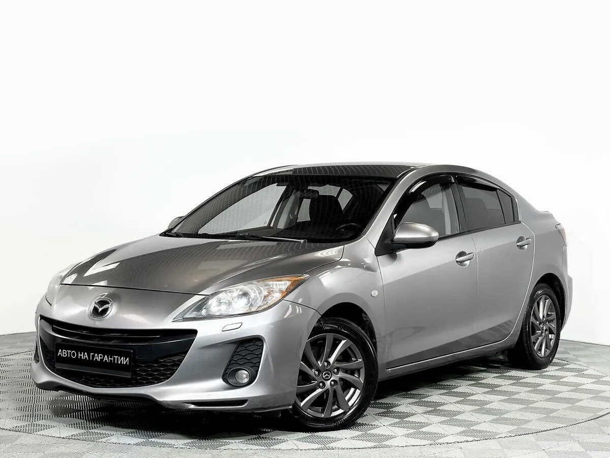 Mazda 3 II (BL) Рестайлинг · Touring