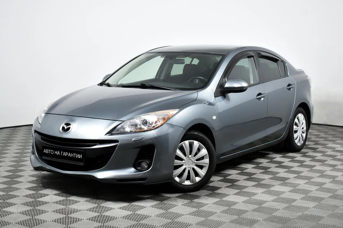Mazda 3 II (BL) Рестайлинг · Touring