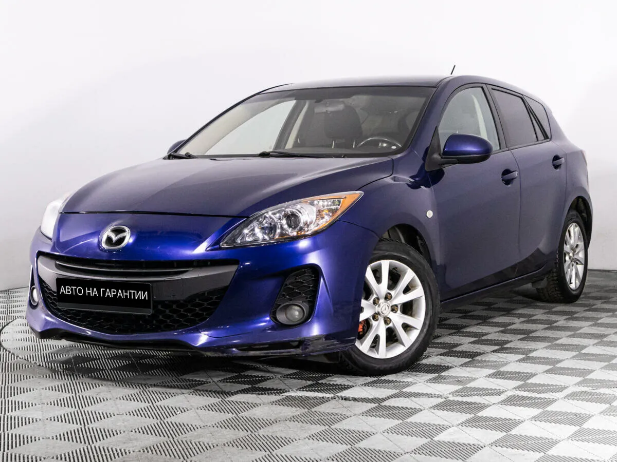 Mazda 3 II (BL) Рестайлинг · Touring
