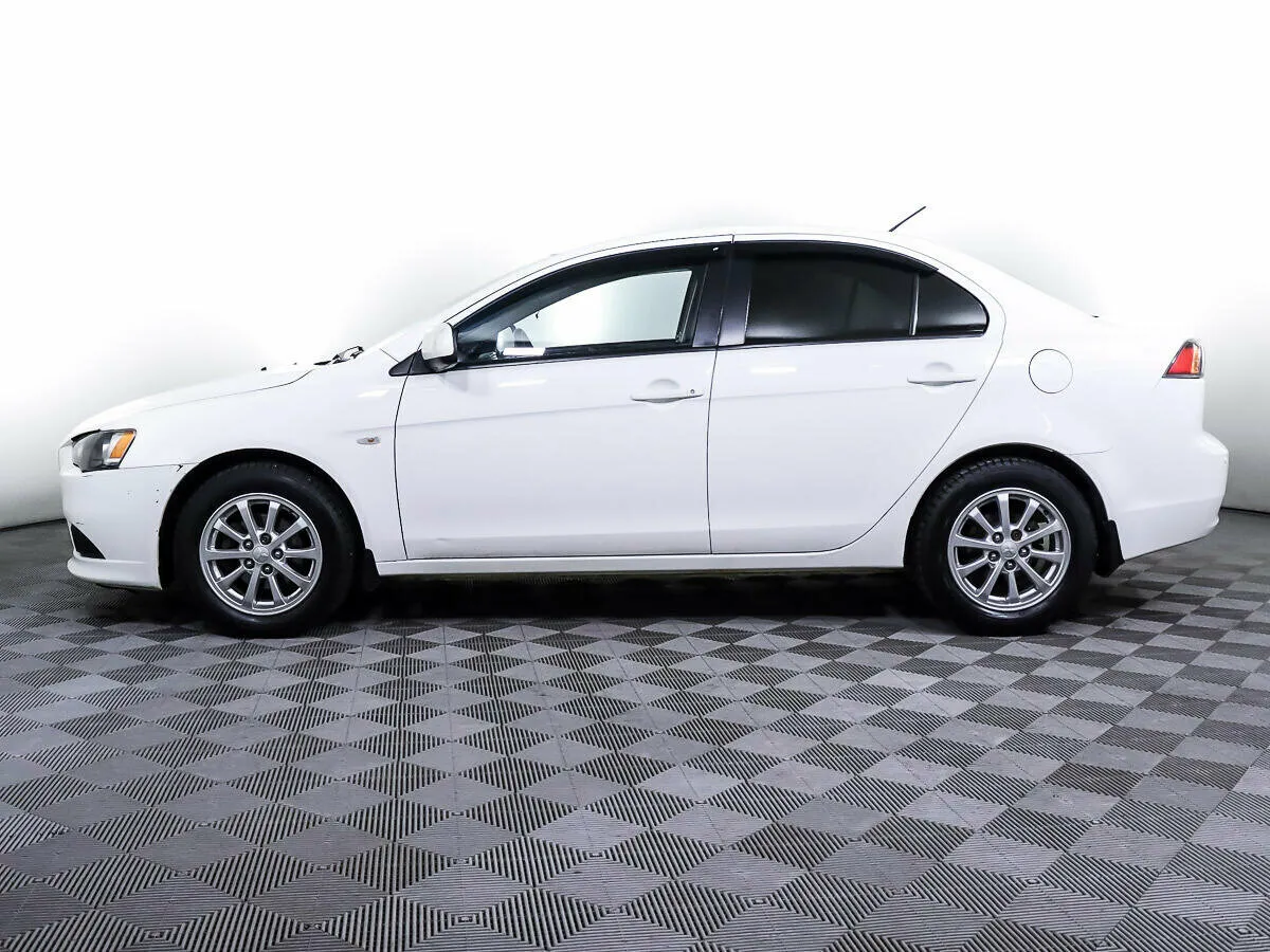 Mitsubishi Lancer X Рестайлинг · Invite — фото 3