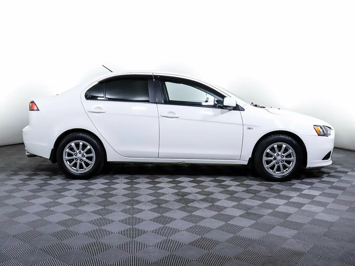 Mitsubishi Lancer X Рестайлинг · Invite — фото 4