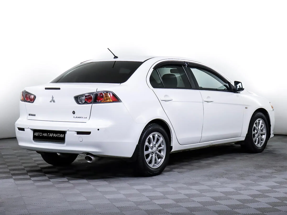 Mitsubishi Lancer X Рестайлинг · Invite — фото 5