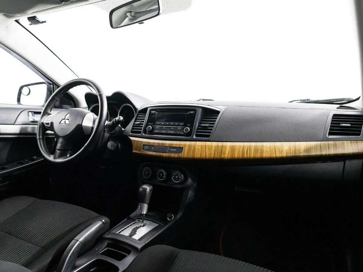 Mitsubishi Lancer X Рестайлинг · Invite — фото 5