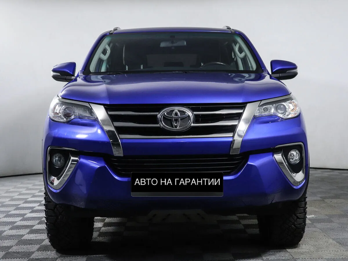 Toyota Fortuner II · Стандарт — фото 2