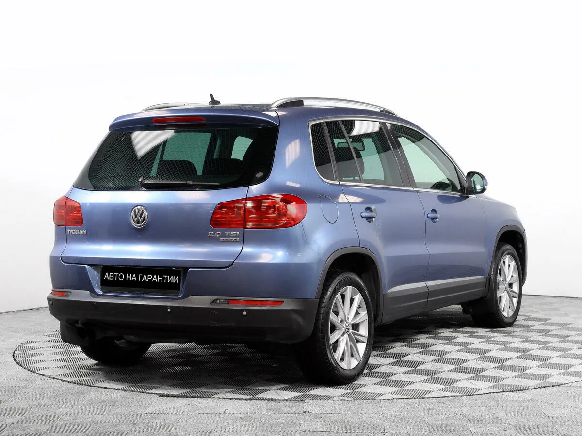 Volkswagen Tiguan I Рестайлинг · Adventure — фото 3