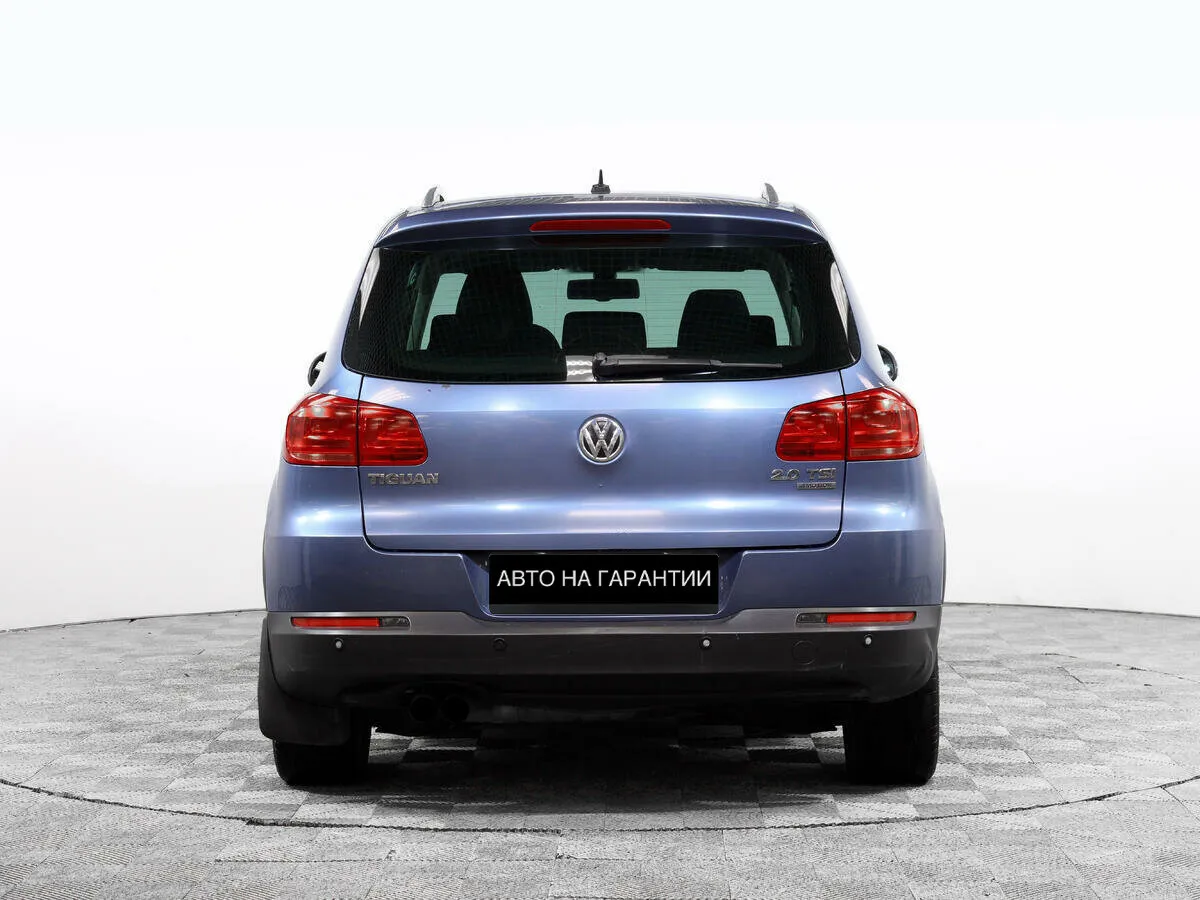 Volkswagen Tiguan I Рестайлинг · Adventure — фото 4