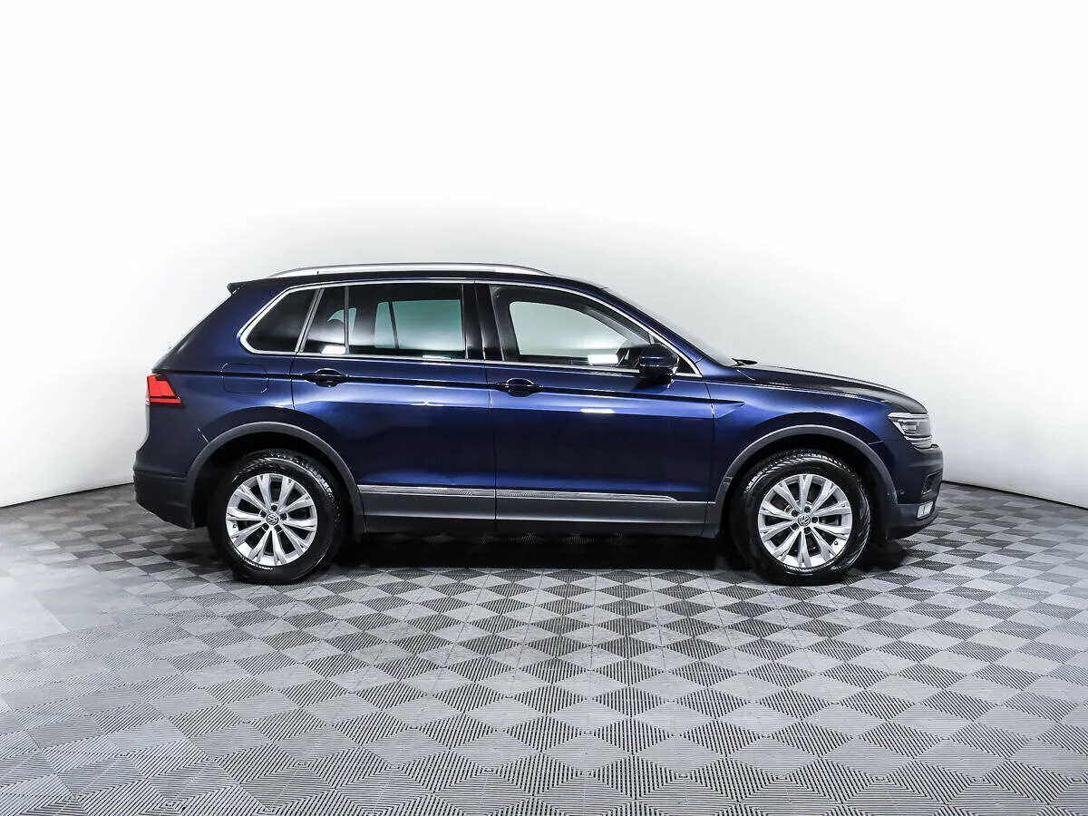 Volkswagen Tiguan II · Highline — фото 4