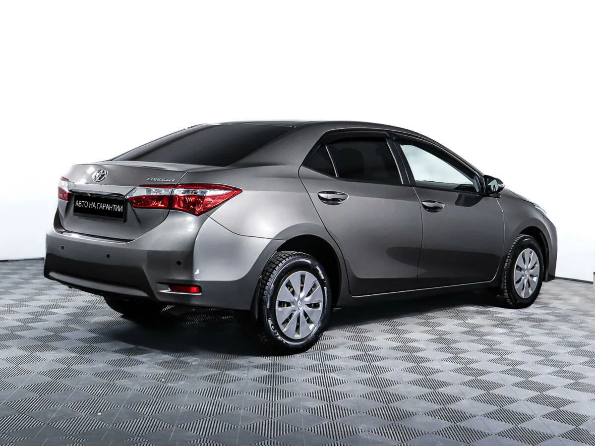 Toyota Corolla XI (E160, E170, E180) Рестайлинг 1 · Стиль Плюс — фото 5