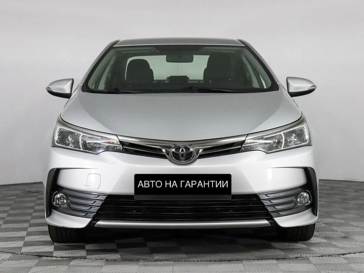 Toyota Corolla XI (E160, E170, E180) Рестайлинг 1 · Стиль — фото 2