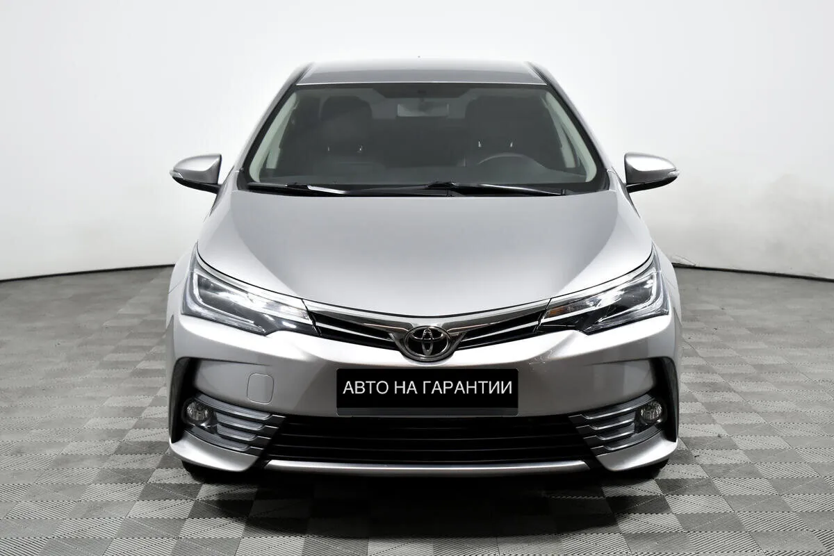 Toyota Corolla XI (E160, E170, E180) Рестайлинг 1 · Стиль — фото 2