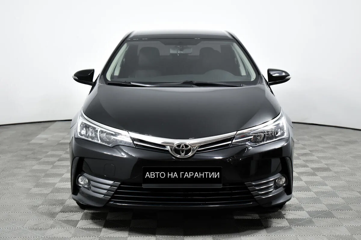 Toyota Corolla XI (E160, E170, E180) Рестайлинг 1 · Комфорт — фото 2