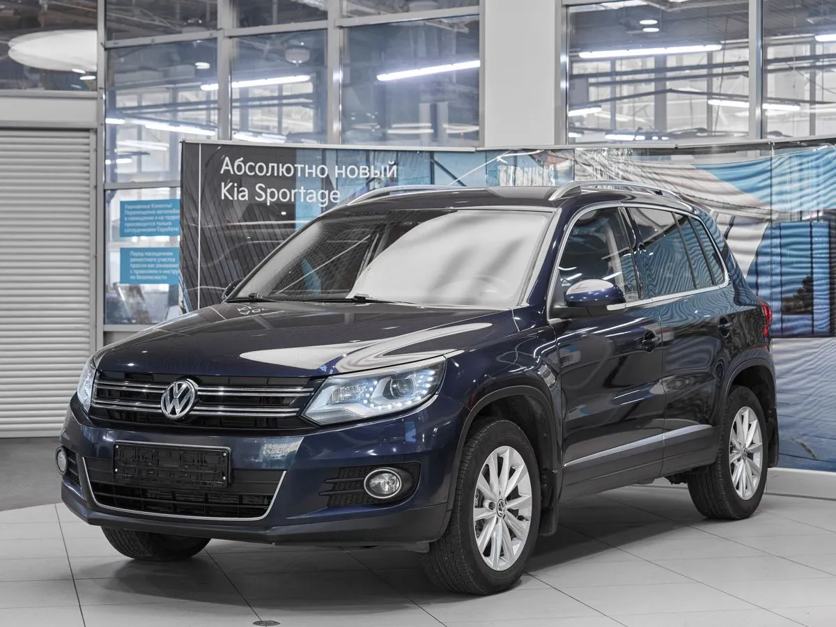 Volkswagen Tiguan I Рестайлинг · Sport