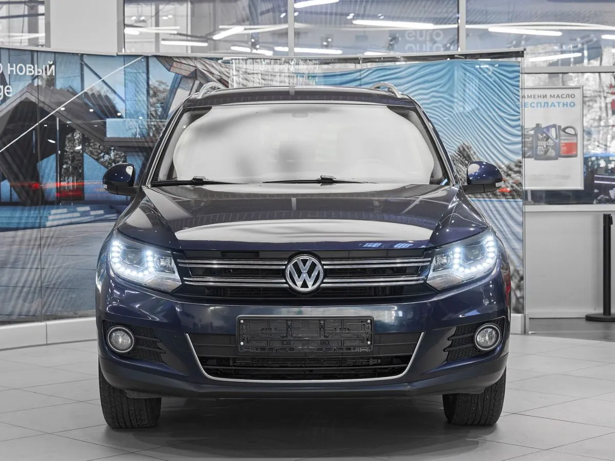 Volkswagen Tiguan I Рестайлинг · Sport — фото 2