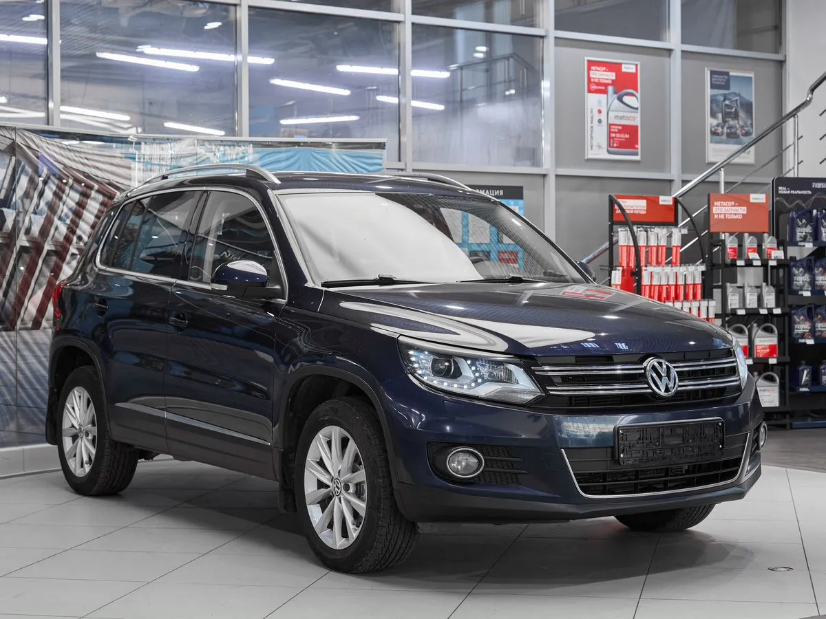 Volkswagen Tiguan I Рестайлинг · Sport — фото 3