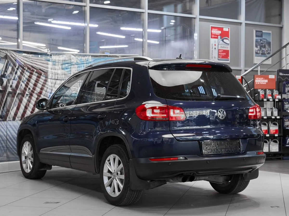 Volkswagen Tiguan I Рестайлинг · Sport — фото 4