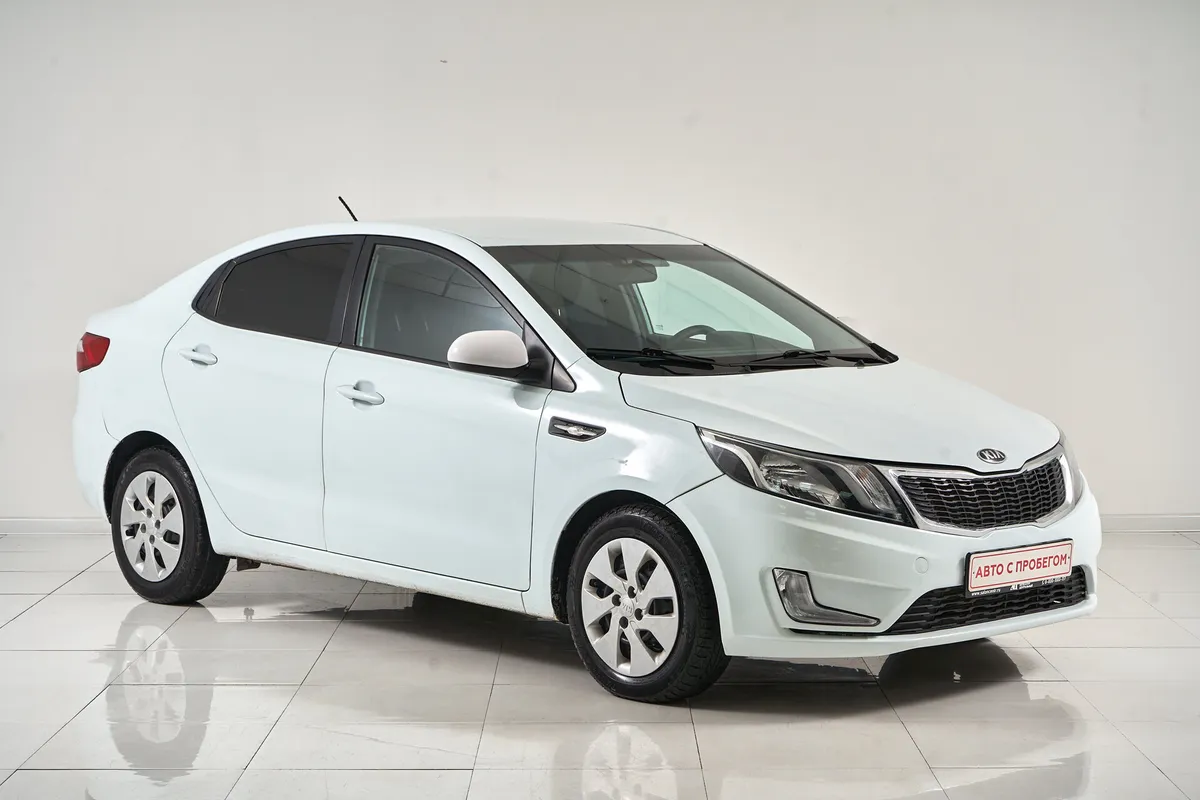 Kia Rio III — фото 3