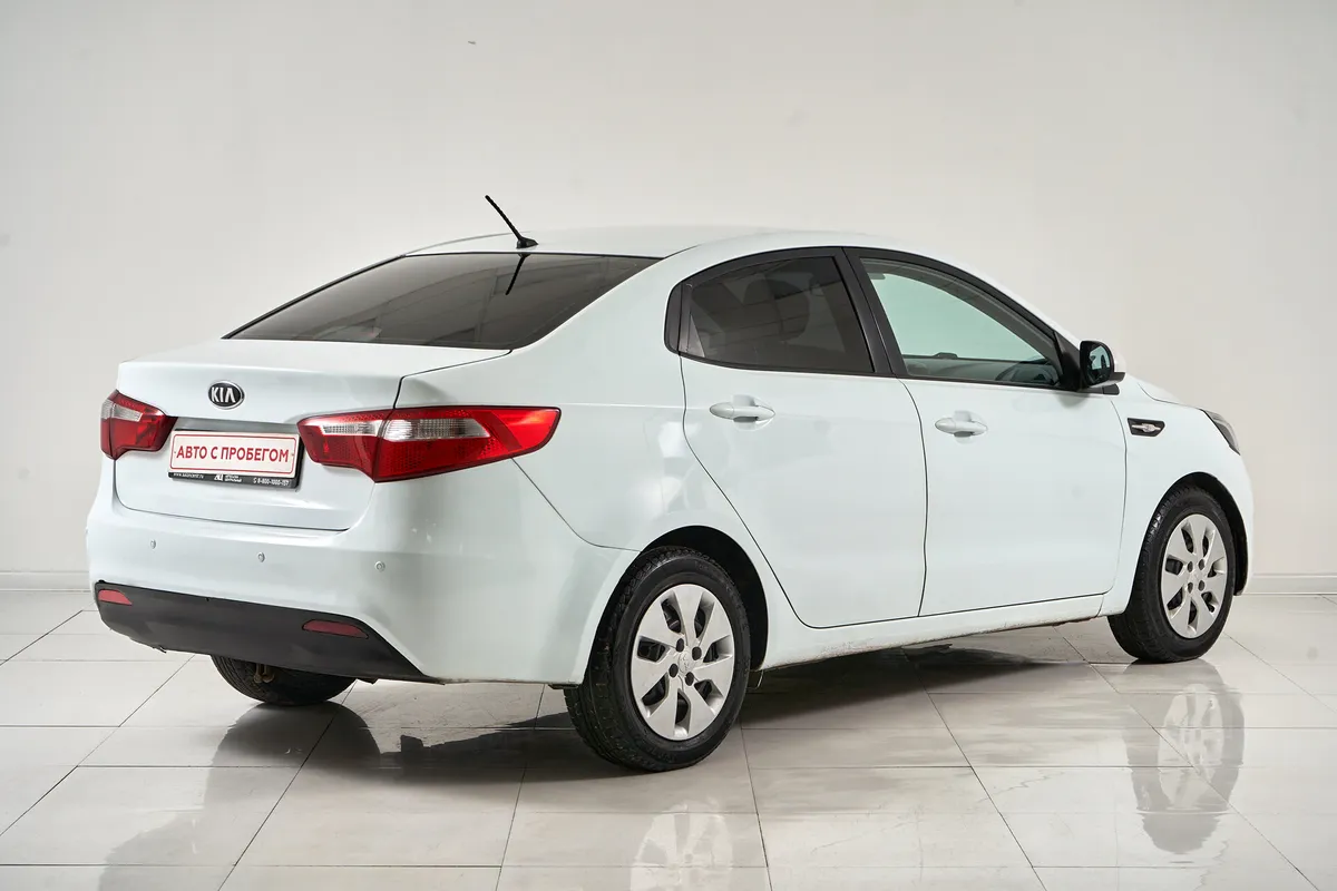 Kia Rio III — фото 5