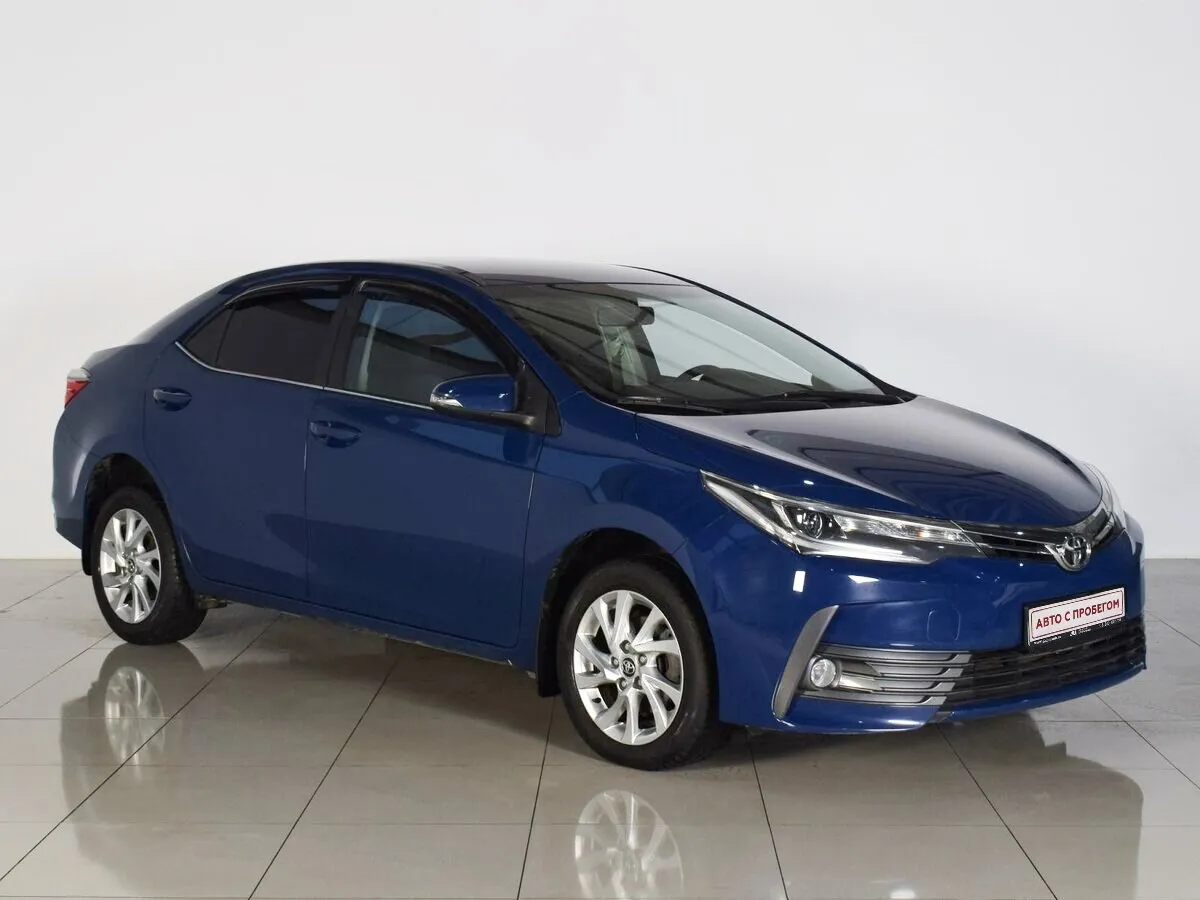 Toyota Corolla XI (E160, E170, E180) Рестайлинг 1 · Комфорт
